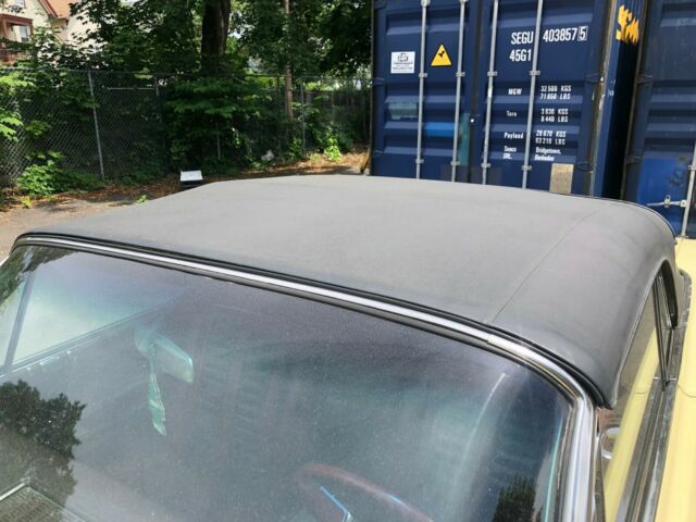 1962 Yellow Oldsmobile Starfire Coupe