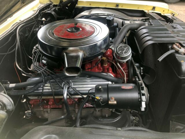 1962 Yellow Oldsmobile Starfire Coupe