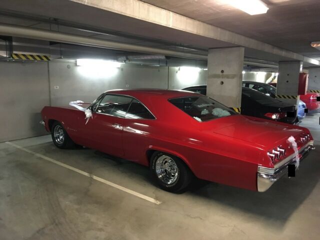 1965 Red Chevrolet Impala Coupe