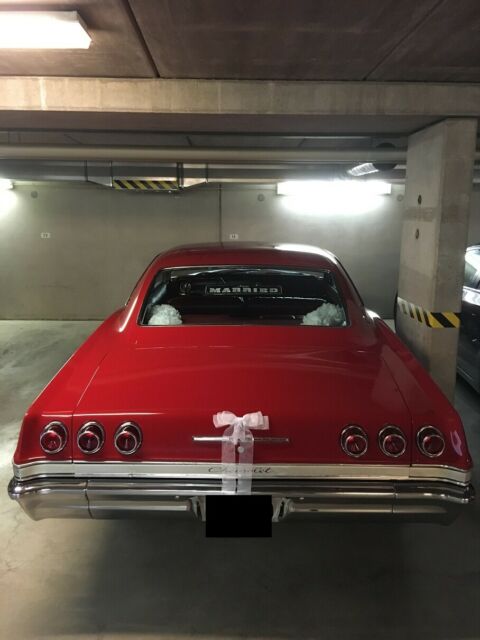 1965 Red Chevrolet Impala Coupe
