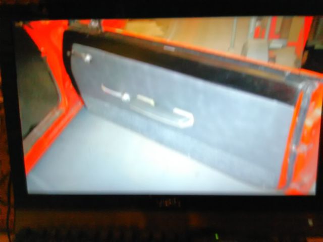 1965 Red Chevrolet Corvair Coupe