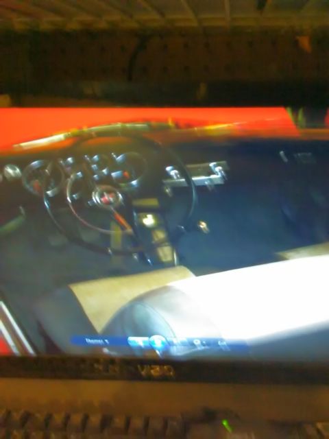 1965 Red Chevrolet Corvair Coupe