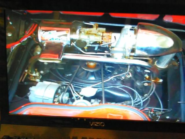 1965 Red Chevrolet Corvair Coupe