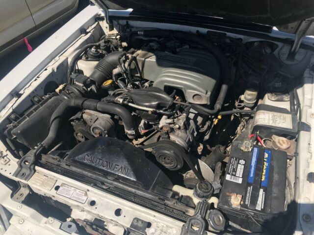 1990 White Ford Mustang Convertible