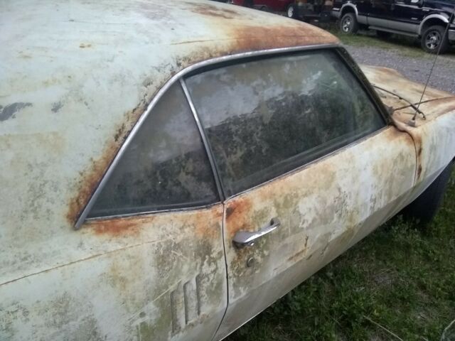 1968 white Pontiac Firebird Coupe