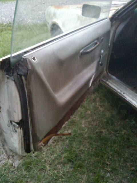 1968 white Pontiac Firebird Coupe