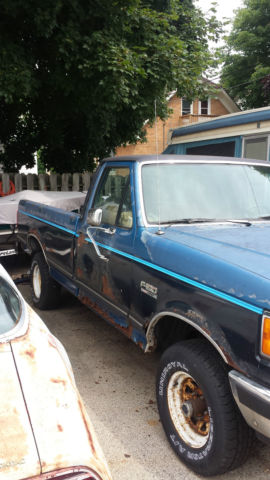 1990 Blue Ford F-150 Standard Cab Pickup