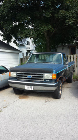 1990 Blue Ford F-150 Standard Cab Pickup