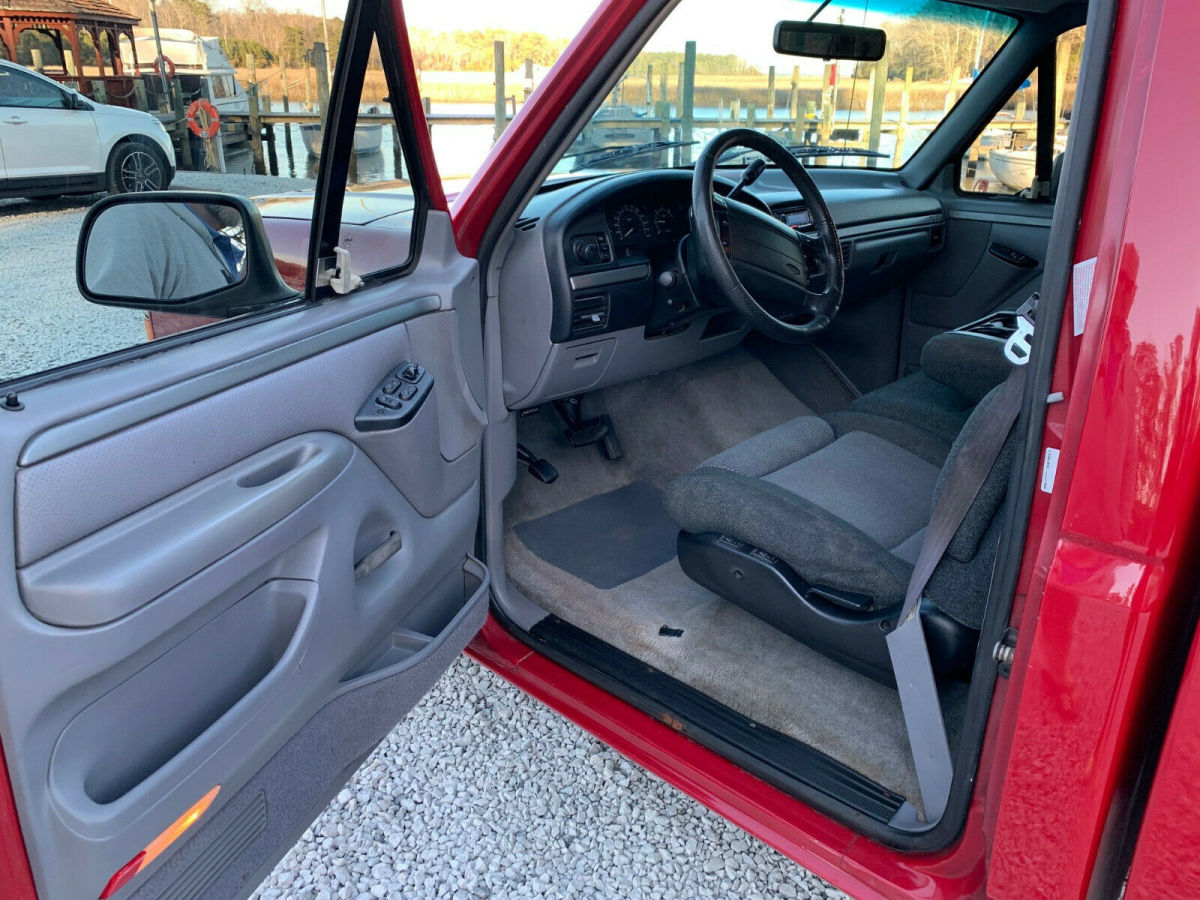 1994 Red Ford F-150 Standard Cab Pickup