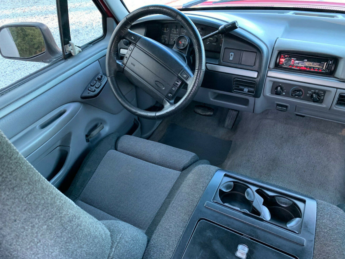 1994 Red Ford F-150 Standard Cab Pickup