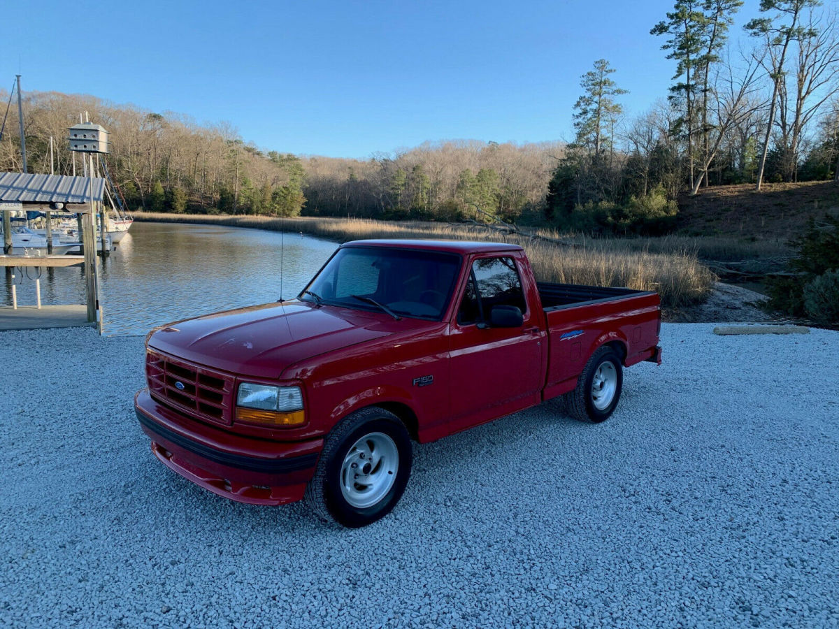 1994 Red Ford F-150 Standard Cab Pickup