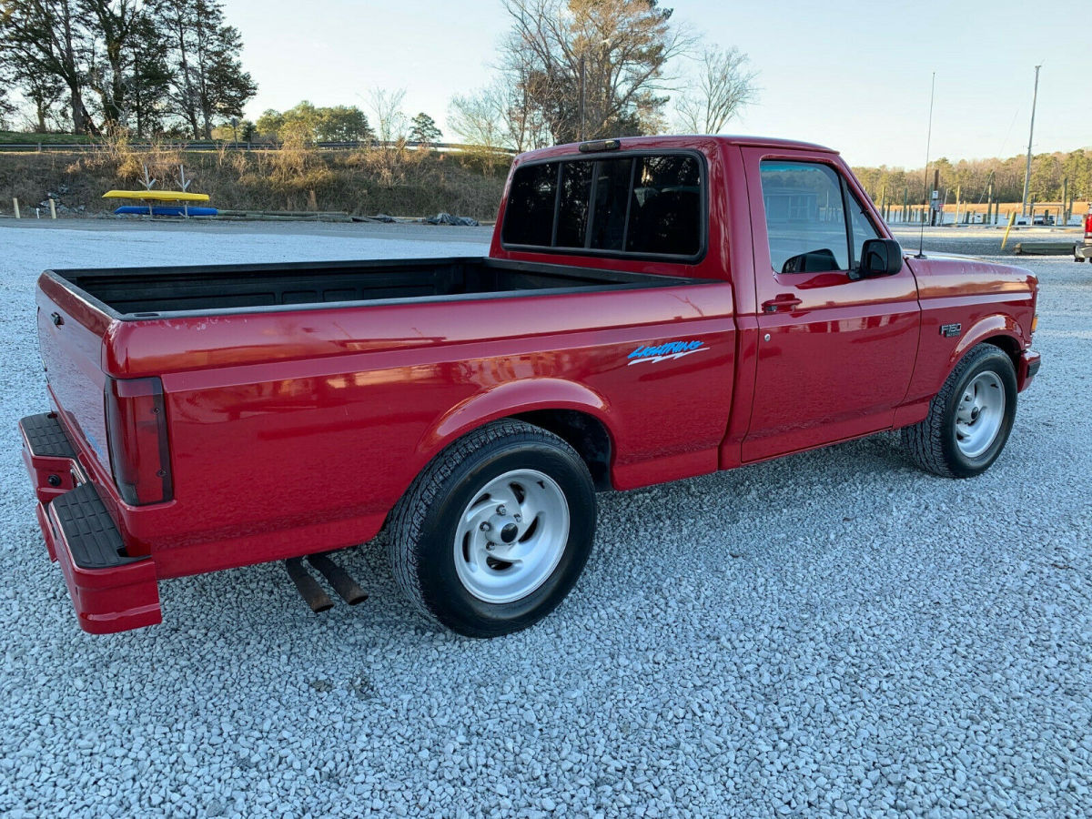 1994 Red Ford F-150 Standard Cab Pickup