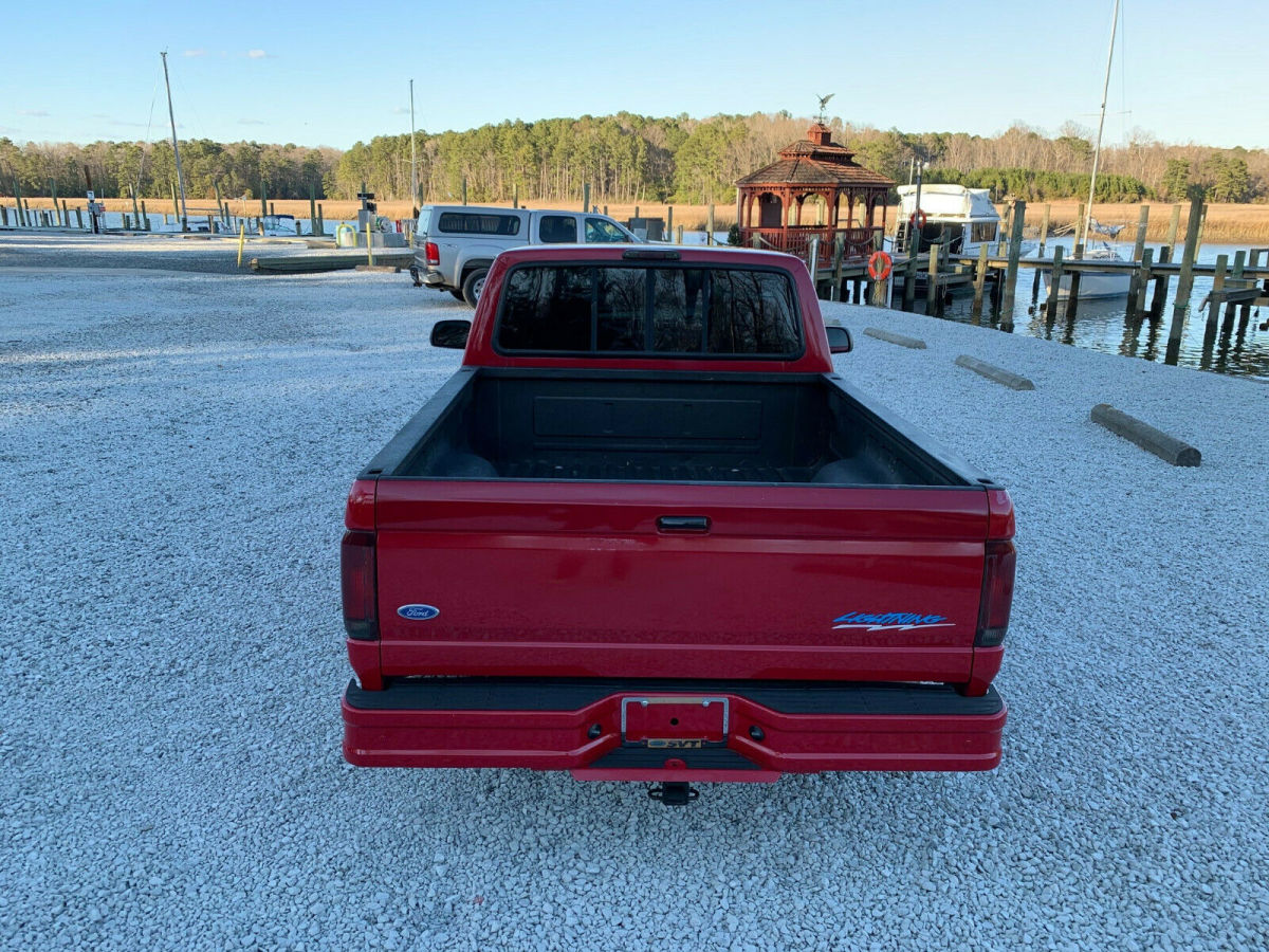 1994 Red Ford F-150 Standard Cab Pickup
