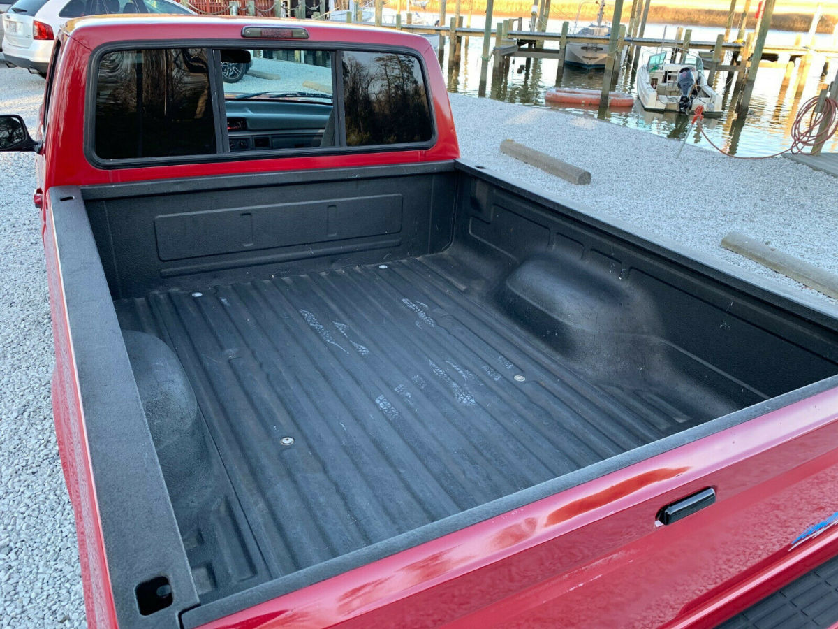 1994 Red Ford F-150 Standard Cab Pickup