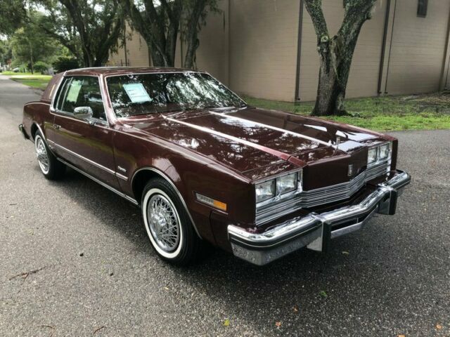 1984 Burgundy Oldsmobile Toronado Coupe