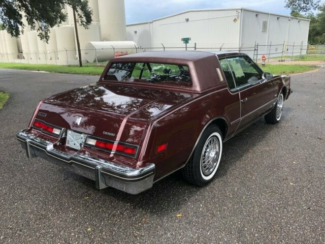 1984 Burgundy Oldsmobile Toronado Coupe