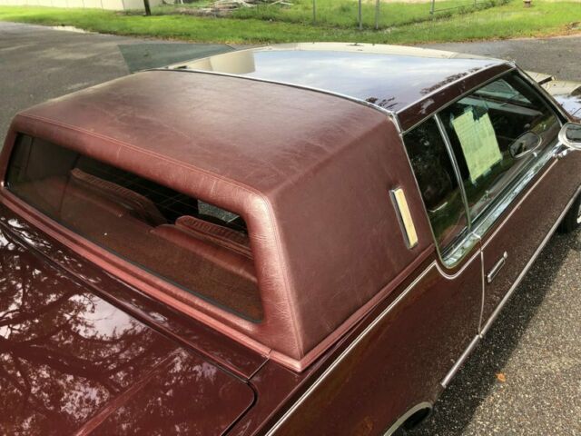 1984 Burgundy Oldsmobile Toronado Coupe