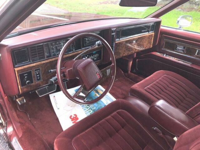 1984 Burgundy Oldsmobile Toronado Coupe