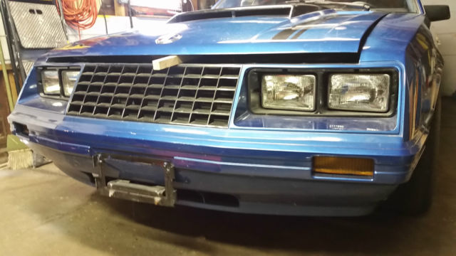 1982 Royal blue Ford Mustang 2 door sedan