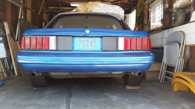 1982 Royal blue Ford Mustang 2 door sedan