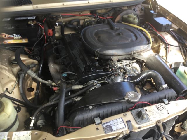 1984 Gold Mercedes-Benz 200-Series Wagon