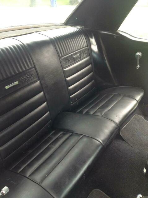 1965 Burgundy Ford Mustang Coupe