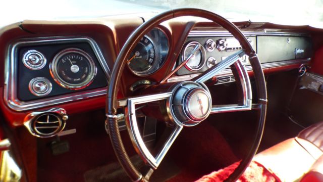 1966 Burgundy Oldsmobile Starfire Coupe