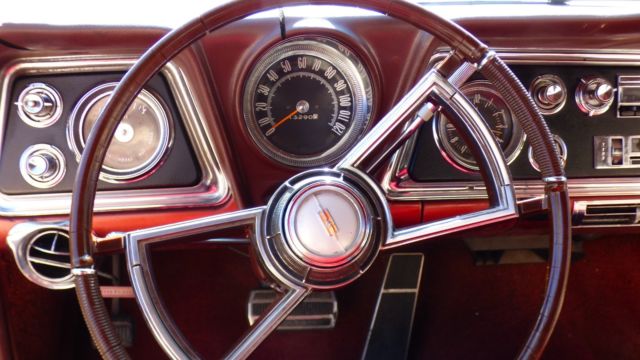 1966 Burgundy Oldsmobile Starfire Coupe