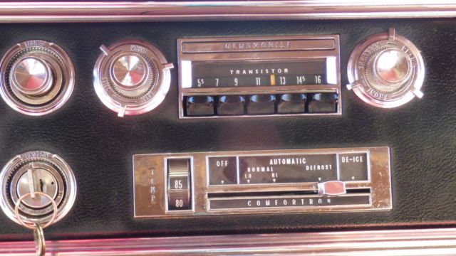 1966 Burgundy Oldsmobile Starfire Coupe