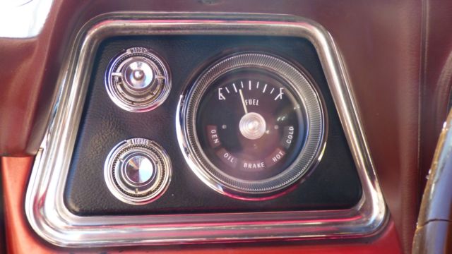 1966 Burgundy Oldsmobile Starfire Coupe