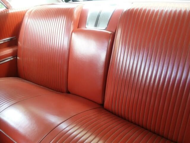 1962 Black (originally white but you can't tell) Pontiac Grand Prix Coupe