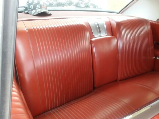 1962 Black (originally white but you can't tell) Pontiac Grand Prix Coupe