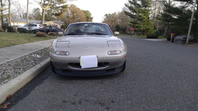 1990 Gold Mazda MX-5 Miata