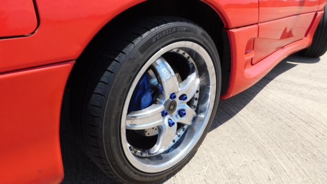 1994 red Mitsubishi 3000GT Coupe