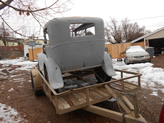 1931 black and gray Ford Model A Sedan