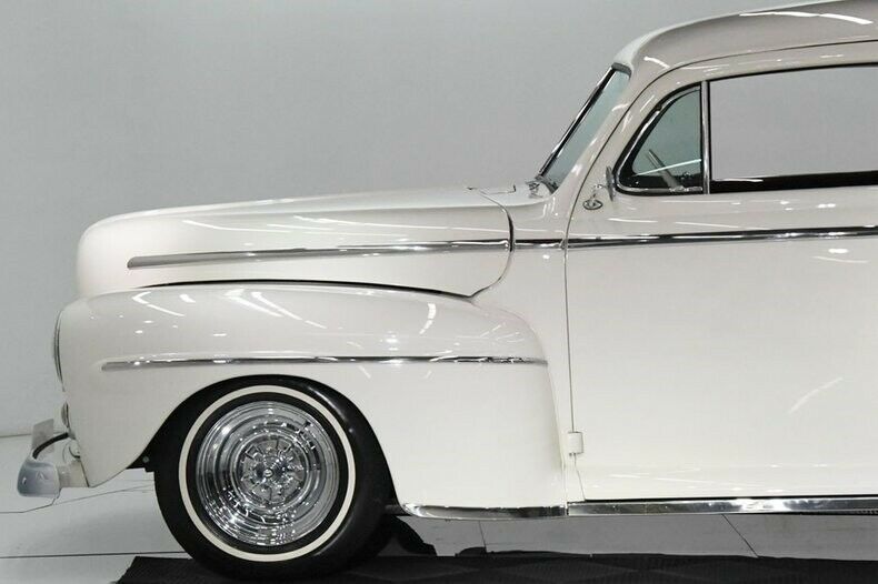 1947 Cool Vanilla Ford Deluxe Coupe