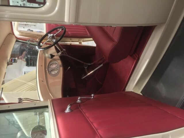 1932 cream Ford Model A Coupe