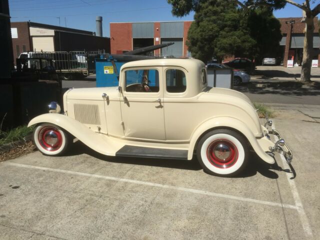 1932 cream Ford Model A Coupe
