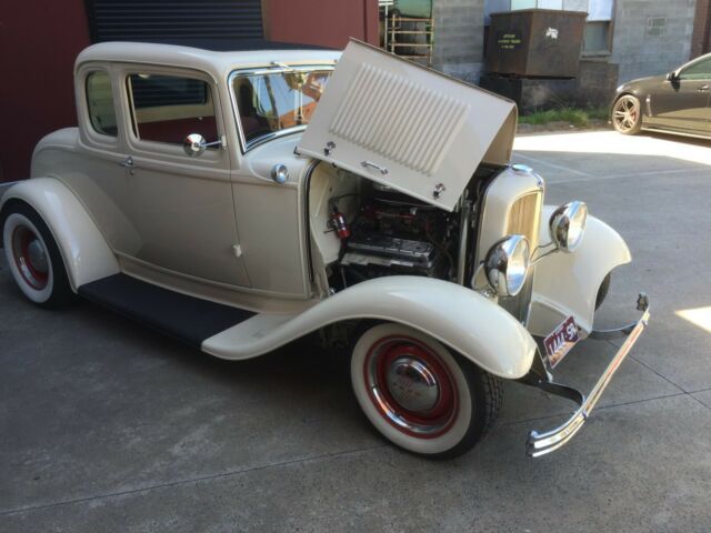 1932 cream Ford Model A Coupe