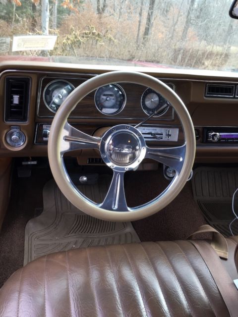 1972 Red metallic Oldsmobile Cutlass Coupe