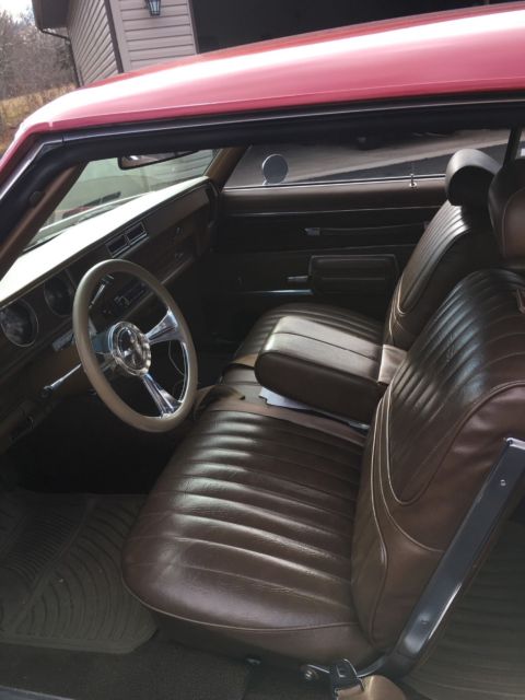 1972 Red metallic Oldsmobile Cutlass Coupe