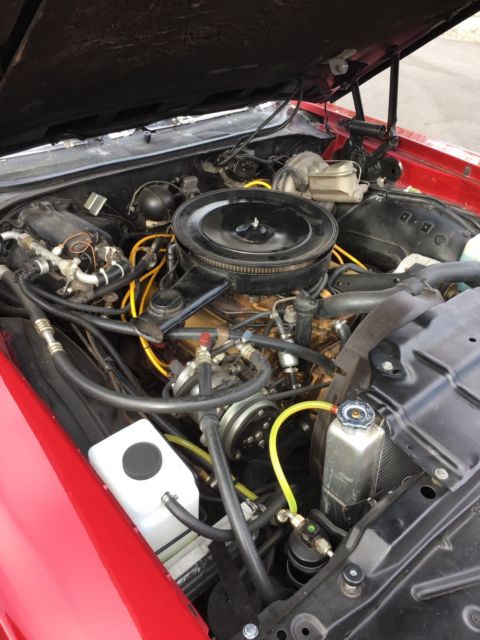 1972 Red metallic Oldsmobile Cutlass Coupe