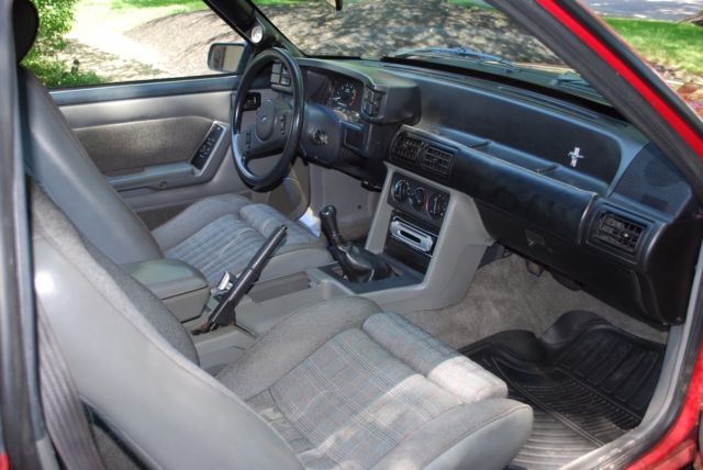 1987 red Ford Mustang Coupe