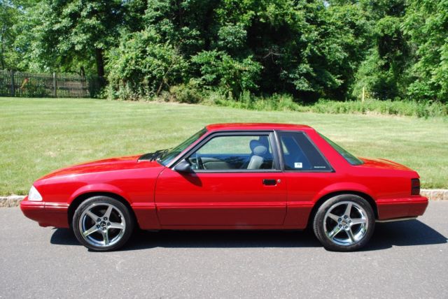 1987 red Ford Mustang Coupe