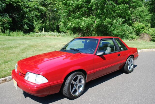 1987 red Ford Mustang Coupe