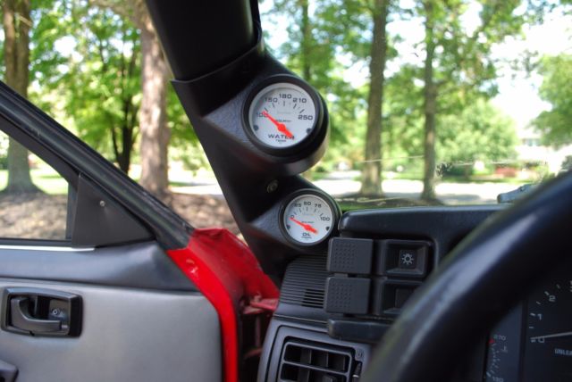 1987 red Ford Mustang Coupe