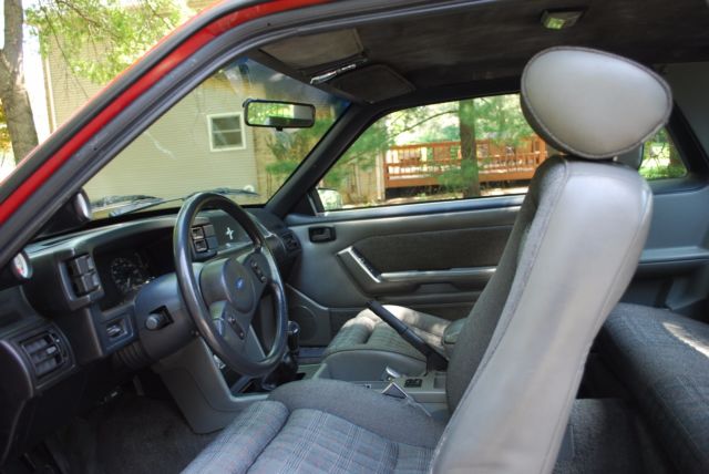 1987 red Ford Mustang Coupe