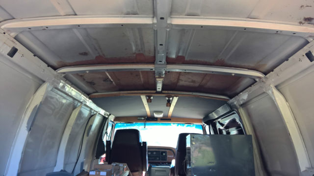 1991 Burgundy Ford E-Series Van extended cargo