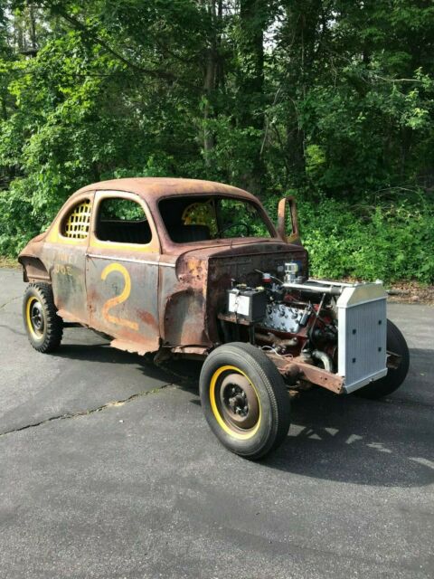 1941 Rust Ford Deluxe Coupe