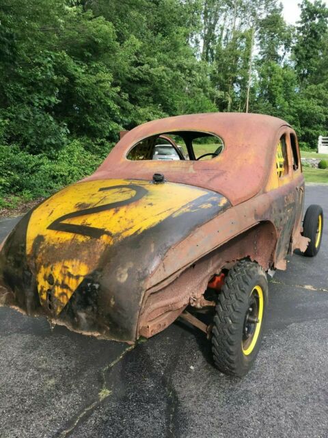 1941 Rust Ford Deluxe Coupe